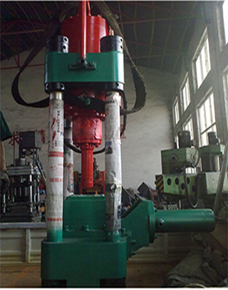 Metal briquetting machine